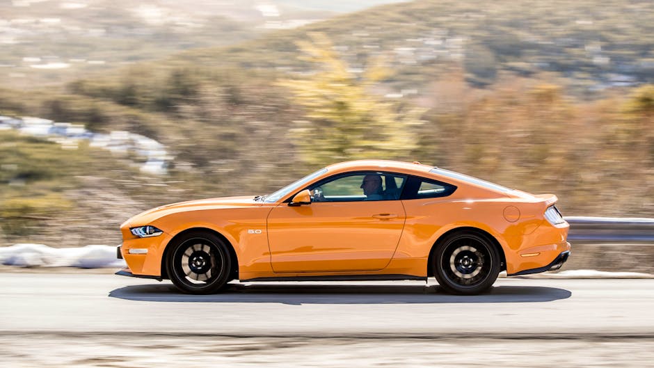 2018 Ford Mustang GT in Orange Fury (side profile)