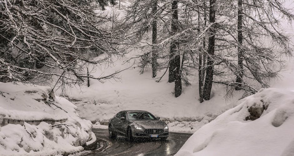 Maserati Quattroporte GTS 2018 in a snowy forest